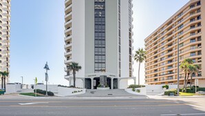 A multi-story hotel with a central atrium and a modern facade. - Dream Daytona Getaway: Beachfront Condo! (Daytona Beach Shores)