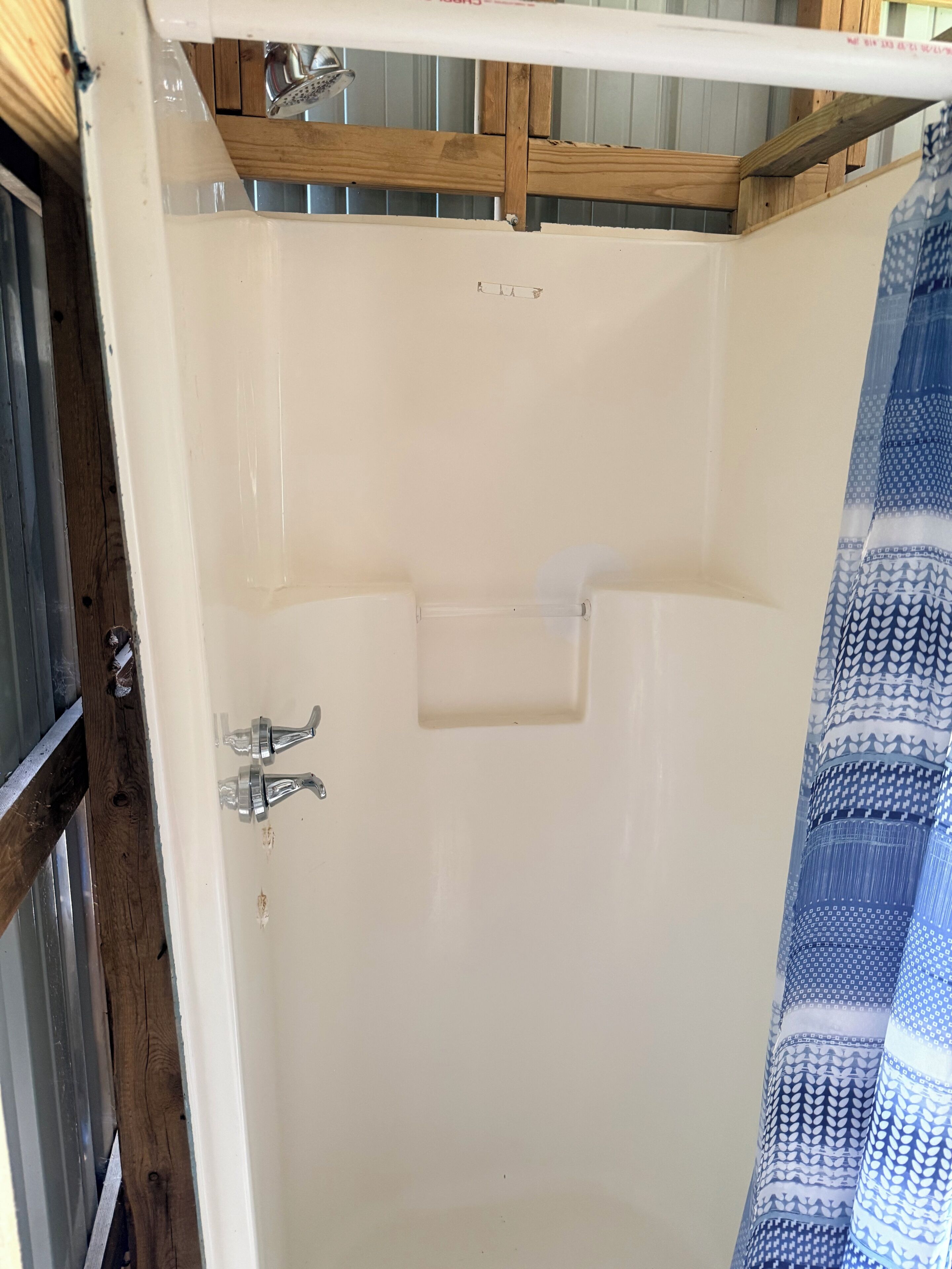 Shower, towels, toilet paper