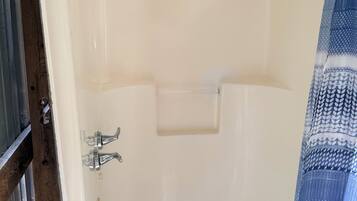 Shower, towels, toilet paper