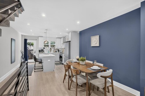 Elegant 4BR · Roof Deck & Movie Rm · 8 Min to CHOP
