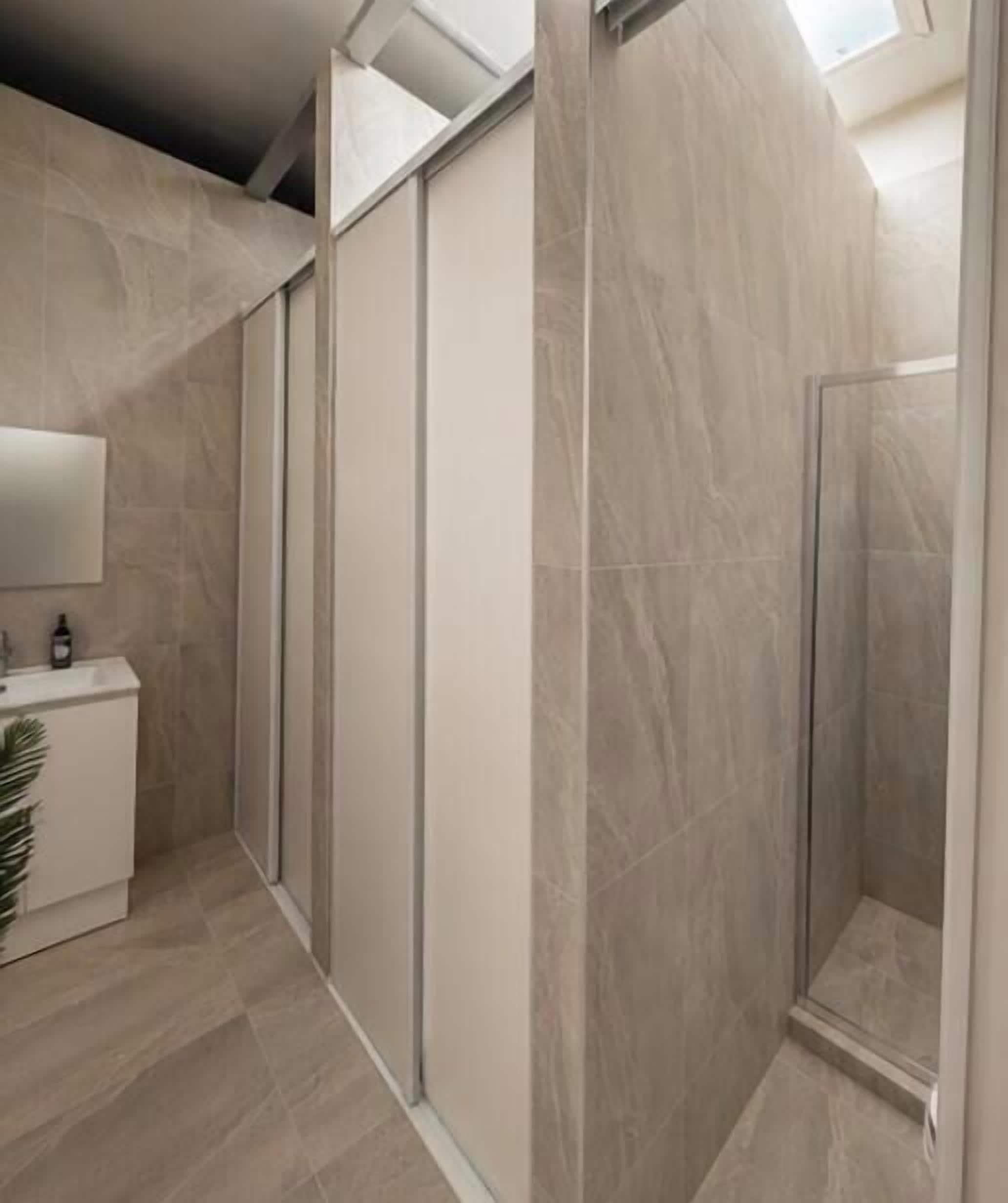 Shower, hair dryer (on request), towels, toilet paper