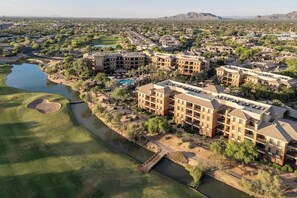 A residential area with multiple apartment buildings, a golf course, and a body of water. - 2 Bedroom Villa at Scottsdale Resort Kid-Friendly (Scottsdale)