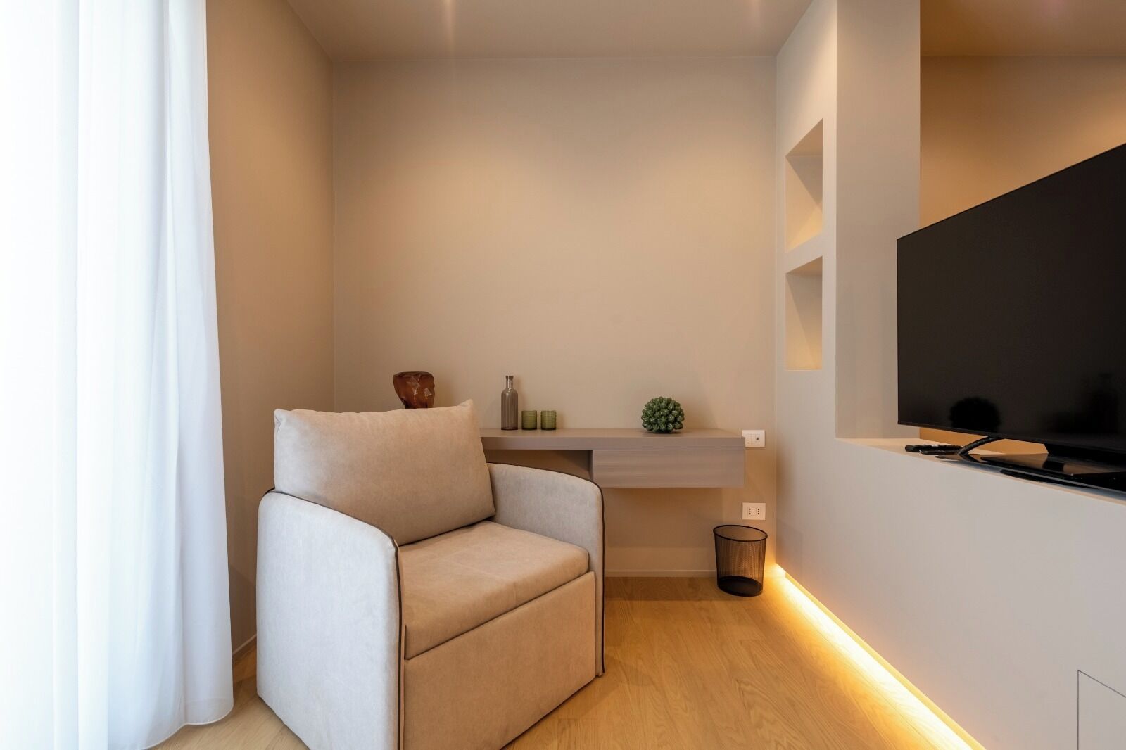 Deluxe-Dreibettzimmer, Stadtblick | Wohnbereich