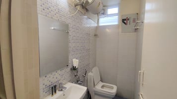 Shower, towels, soap, shampoo