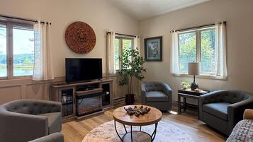 Smart TV, fireplace, DVD player, books