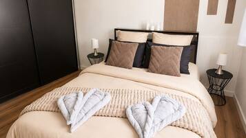 2 dormitorios, tabla de planchar con plancha, wifi y ropa de cama
