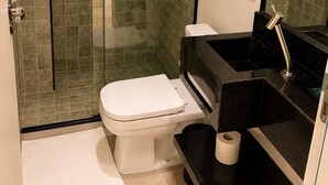 Shower, towels, soap, toilet paper
