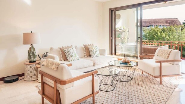 A modern living room with a sofa, two armchairs, a coffee table, and a lamp. - Comfortable apt with 2br w balcony in Portillo (Las Terrenas)