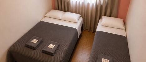 Comfort Quadruple Room, Courtyard View | Laptop workspace, WiFi (free)
