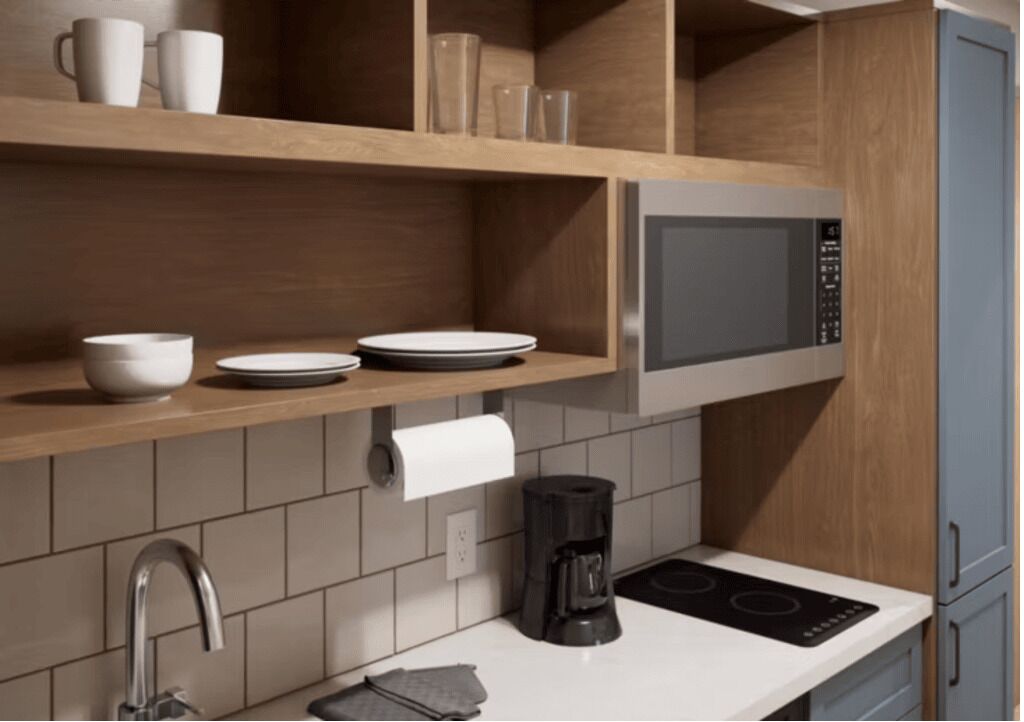 Full-sized fridge, microwave, stovetop, dishwasher