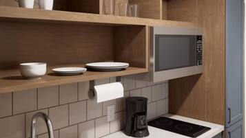 Full-sized fridge, microwave, stovetop, dishwasher