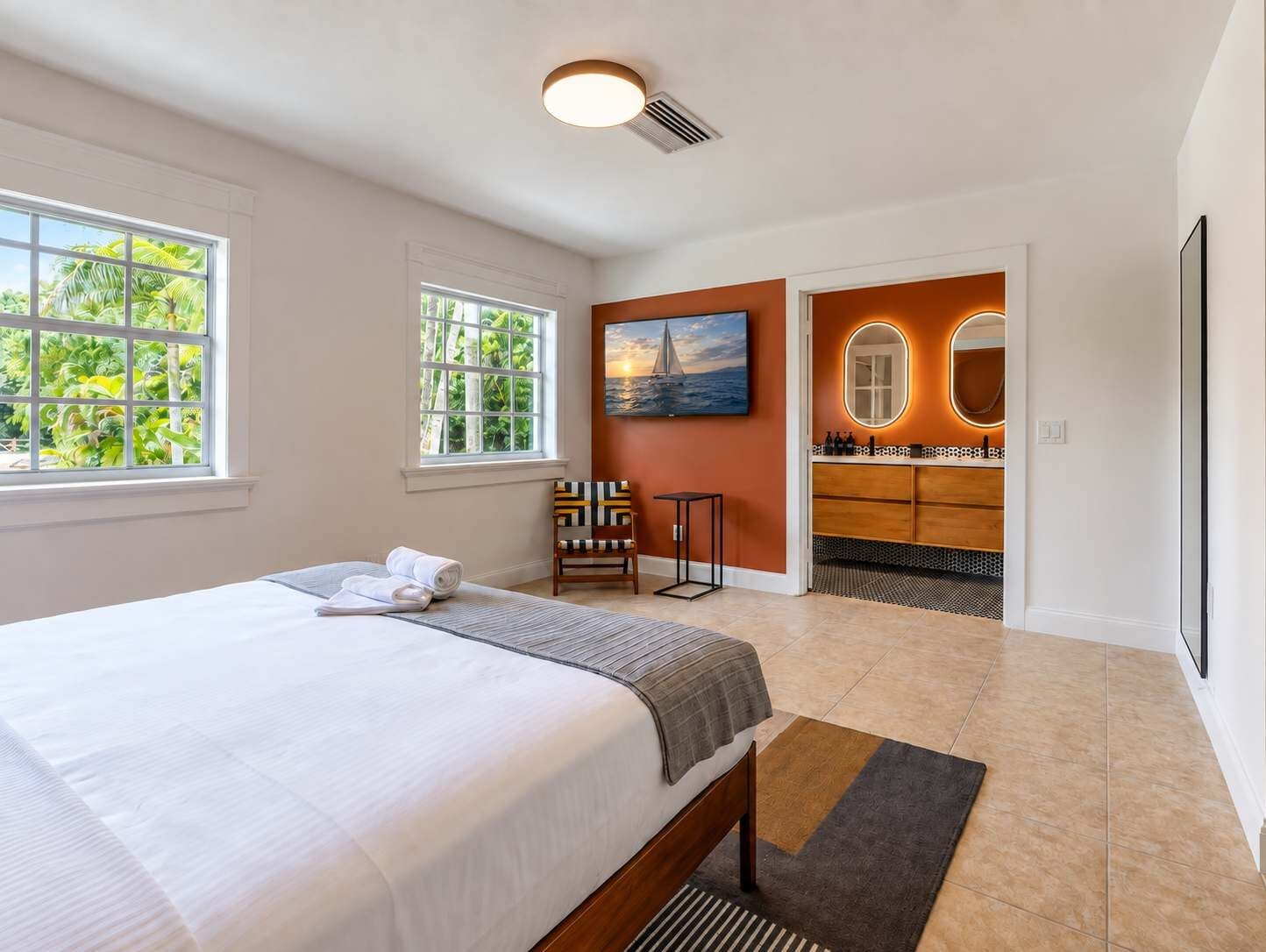 A spacious king bedroom and ensuite bathroom.