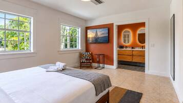 A spacious king bedroom and ensuite bathroom.