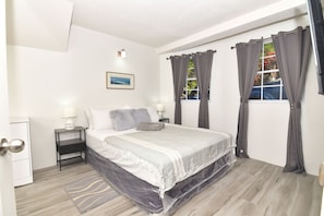 1 bedroom, iron/ironing board, WiFi, bed sheets - 1.1-bed with A/C, roomy living, stainless kitchen, cozy bedroom, sleek bathroom. (Monchy)