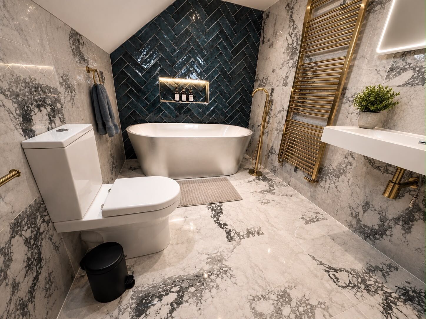 A modern bathroom with a freestanding bathtub, a toilet, a bidet, and a sink.