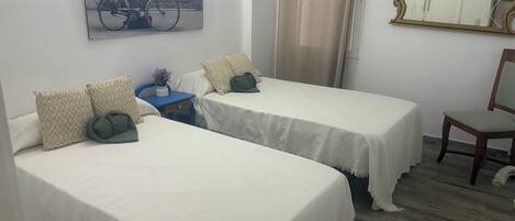 2 habitaciones y ropa de cama