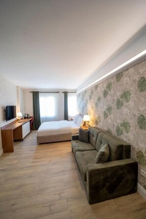 Deluxe Double Room, City View | Living area - MELL CITY SUITES HOTEL (Ortahisar)
