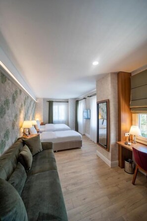 Superior Triple Room, City View | In-room safe, blackout curtains, soundproofing - MELL CITY SUITES HOTEL (Ortahisar)