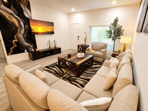 Living area - Modern Disney Escape / Stylish 3BR Condo / Sleeps 8 (Kissimmee)