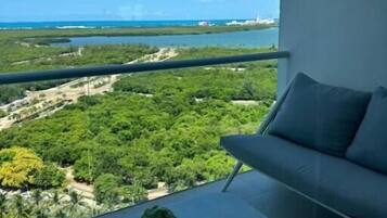 Deluxe Apartment, Balcony, Beach View | Property grounds