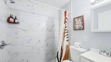 Hair dryer, towels, soap, toilet paper