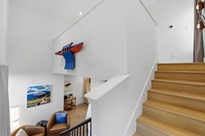 A staircase with wooden steps leading to a landing. - Refined Casita Near Medical District, Parking Included (Fort Worth)
