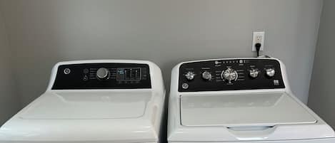 Two front-loading washing machines side by side.