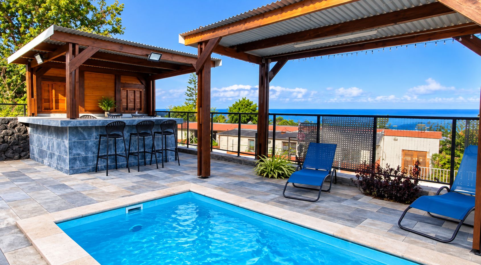 A swimming pool with a bar area and lounge chairs, overlooking a scenic view.
