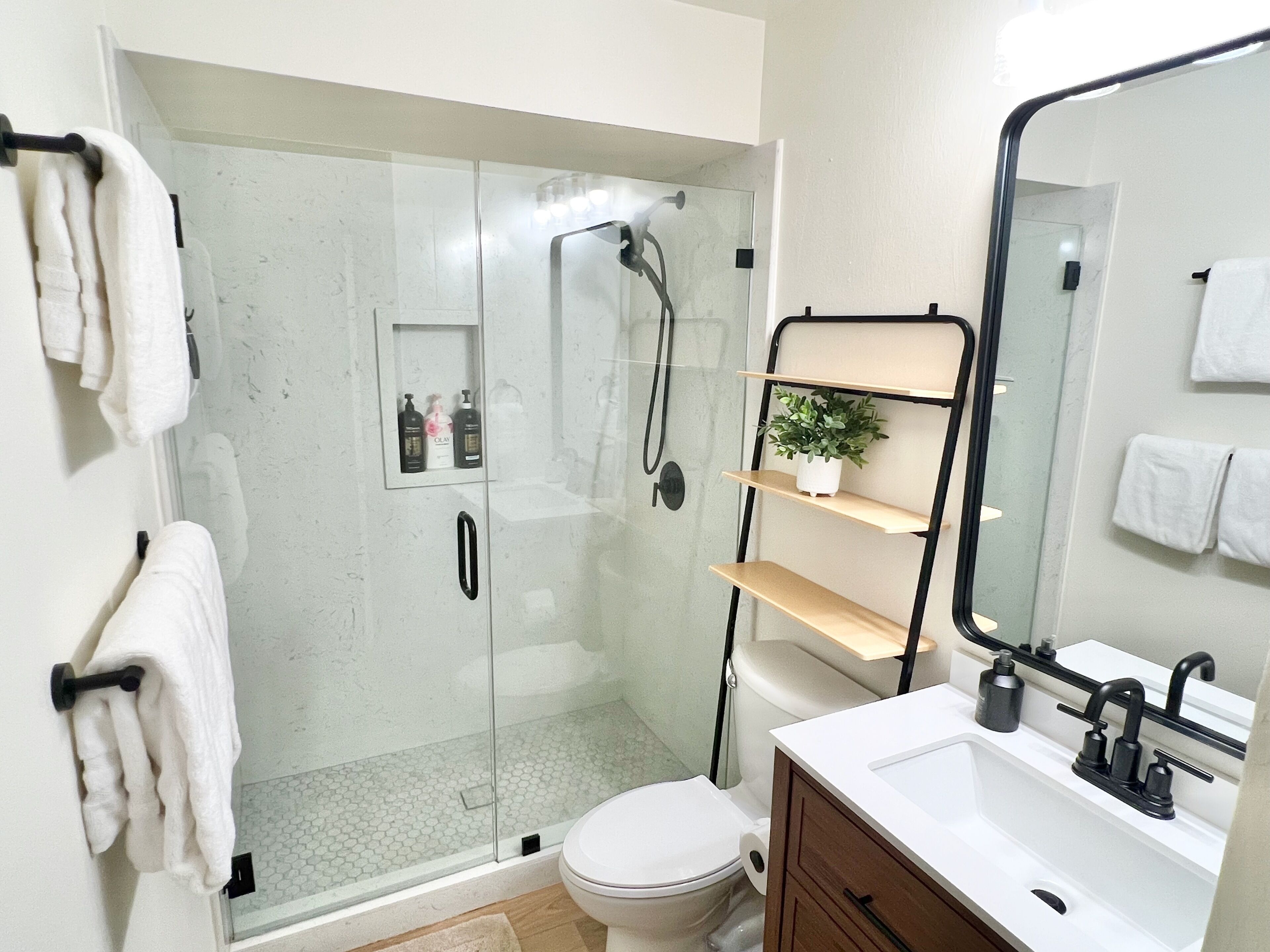 Shower, hair dryer, towels, soap