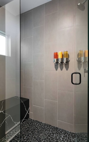 A modern bathroom with grey tiles, a glass shower enclosure, and a marble vanity. - La Ventana Hotel - 1BR Escape Queen Bed, WiFi & Kitchenette (San Diego)