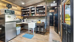 Coffee/tea maker, fridge, microwave, oven
