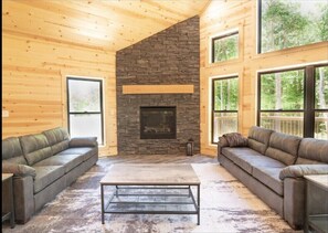 Smart TV, fireplace - The Wooded Obsidian Overlook cabin, with hot tub, games, and close to everything (Logan)