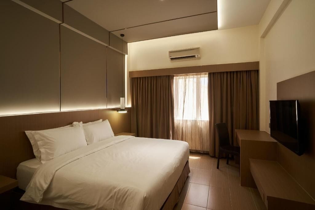 Deluxe Double Room, City View | Blackout drapes, iron/ironing board (on request), WiFi (free)