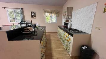 Coffee/tea maker, fridge, stovetop, toaster