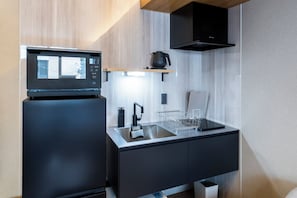 Chambre Deluxe avec lits jumeaux | Cuisine privée