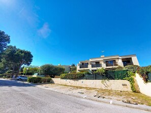 A modern two-story residential building with a flat roof, multiple balconies, and a well-maintained garden. - La Bressado by Interhome (Saint Cyr sur mer Les Lecques)