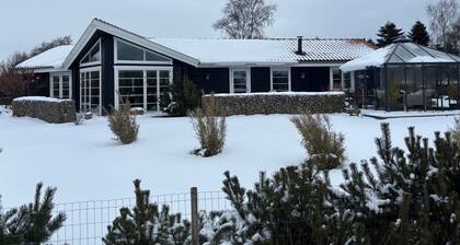House with a view of the ferry on the Isefjord
