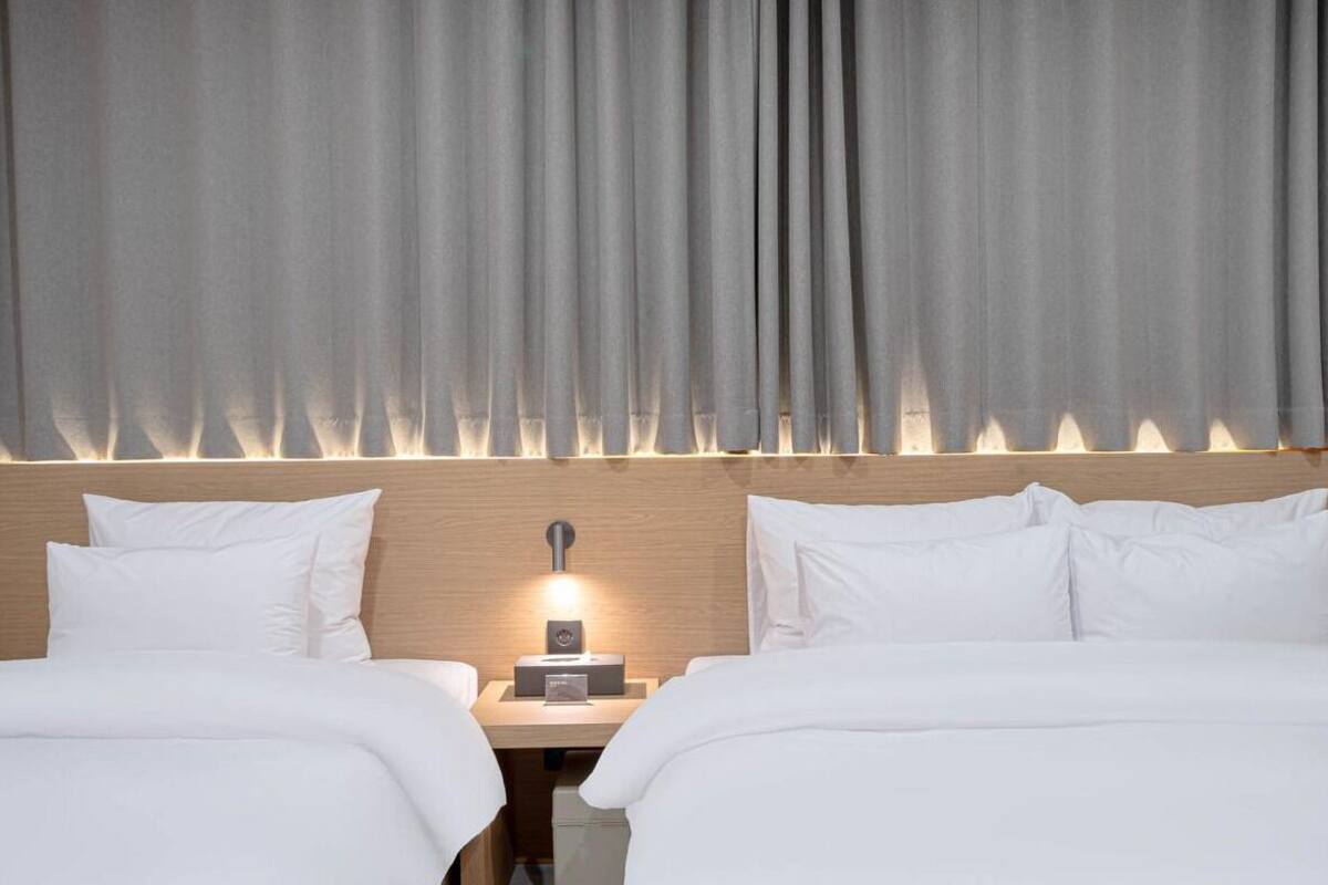 Habitación Signature con 2 camas individuales, no fumadores | Escritorio y wifi gratis