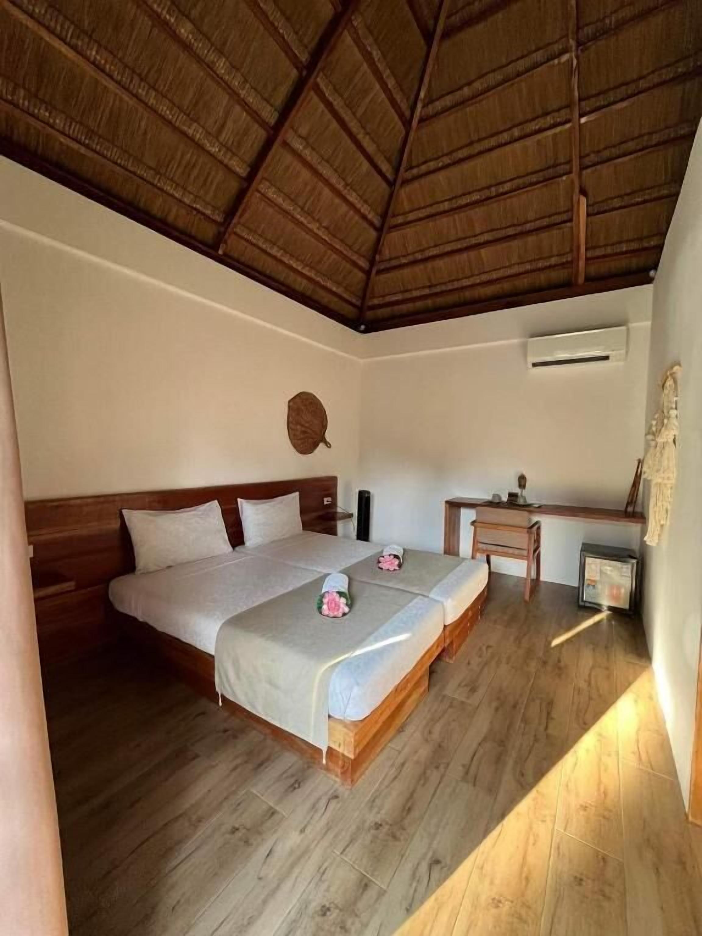 Habitación estándar con 1 cama matrimonial o 2 individuales, vista a la alberca | Wifi gratis 