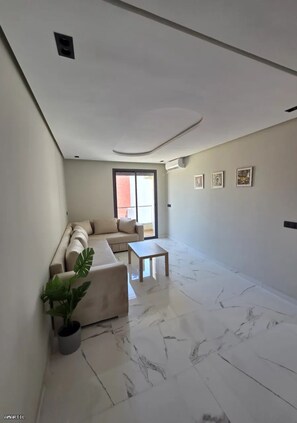 Apartment, 2 Bedrooms, Balcony | Living area - Charming 2-bedroom Apartment in the Heart of Martil, Morocco (Martil)