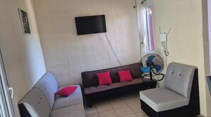 Living area - Acrópolis Apartments with shopping centers nearby (Sonsonate)