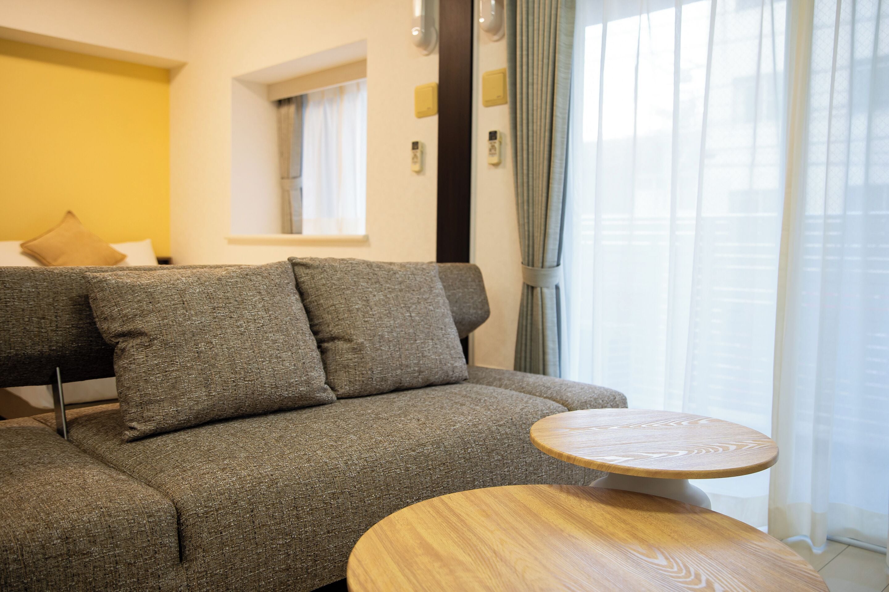 Family Twin Room | Living area | 40-inch flat-screen TV with digital channels