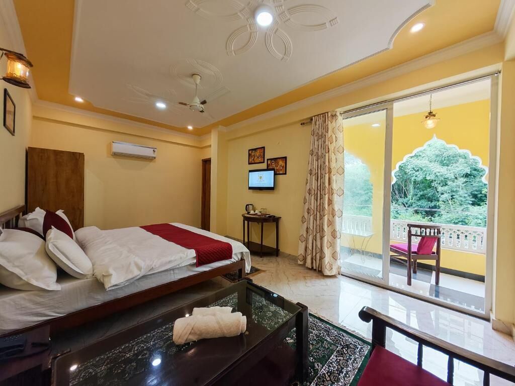 Suite, balcón, vista al jardín | Tabla de planchar con plancha y wifi gratis 
