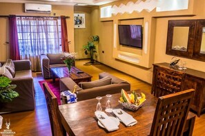 Executive Suite, Balcony, Pool View | Living area - hotel waterbuck (Nakuru County)