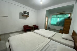 Habitación Deluxe con 2 camas individuales | Wifi gratis y ropa de cama 