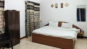 Deluxe Room | Desk, WiFi (free), bed sheets - Hotel The One (Rajkot)