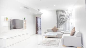 Apartamento Deluxe | Zona de estar
