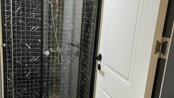 Economy Double Room | Bathroom | Shower, free toiletries, hair dryer, towels
