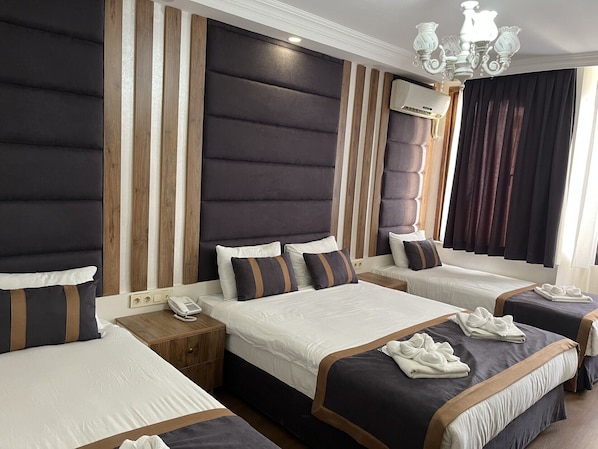 Laptop workspace, free WiFi, bed sheets