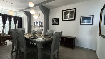 Apartment, 3 Bedrooms, Patio | Dining room